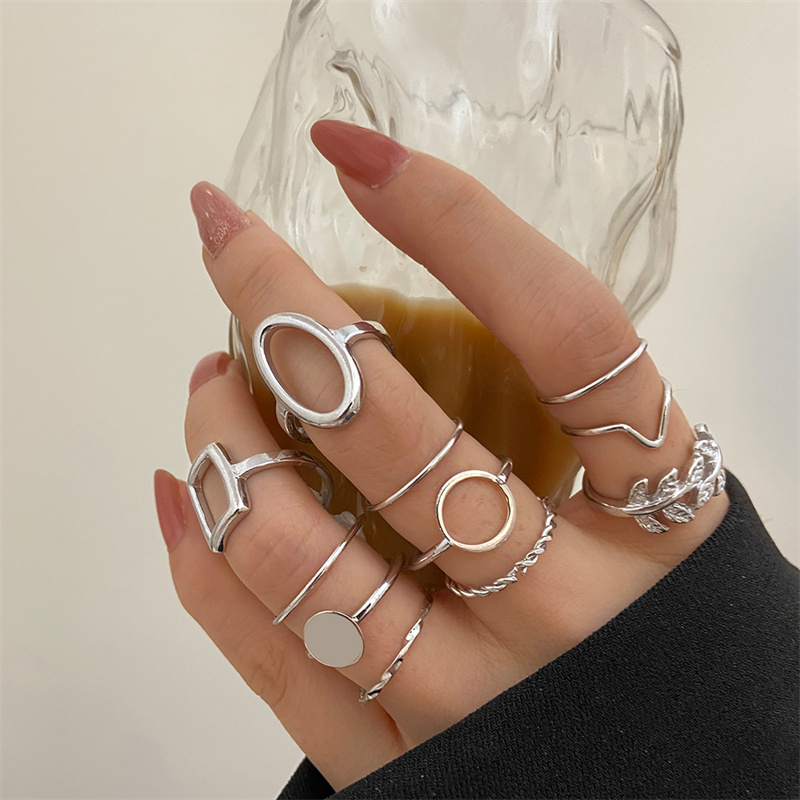 さまざまな色のシルバーとゴールドのメタルビーズのボール,マル - Vintage Punk Knuckle Rings Set のレビューと価格