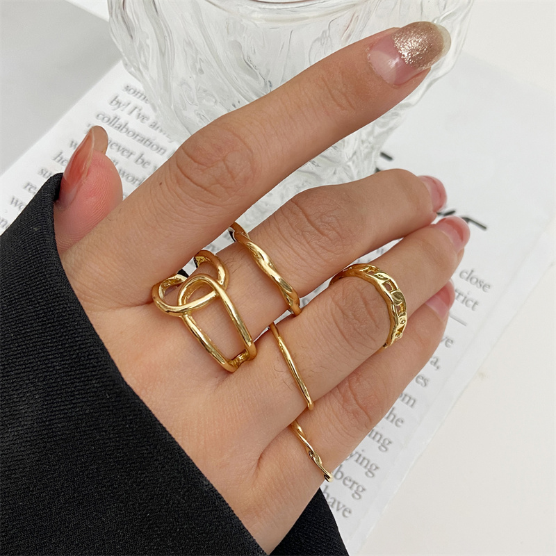 さまざまな色のシルバーとゴールドのメタルビーズのボール,マル - Vintage Punk Knuckle Rings Set のレビューと価格